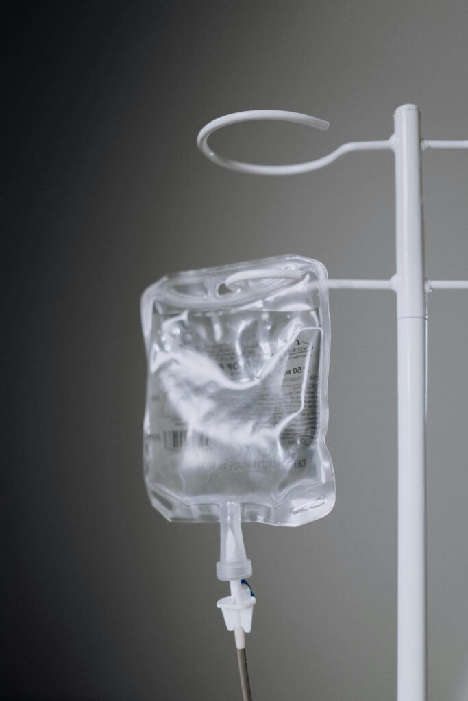 IV therapy to a client for improved hydration and weight loss support